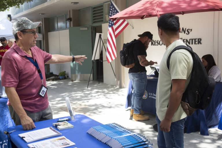 - Brochure table at a college resource event.