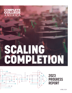 Graduates wearing caps and gowns at a college commencement ceremony, highlighting higher education achievement and college completion rates.