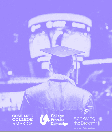 Student in cap and gown at graduation ceremony with digital screens in background, representing success and higher education achievement.