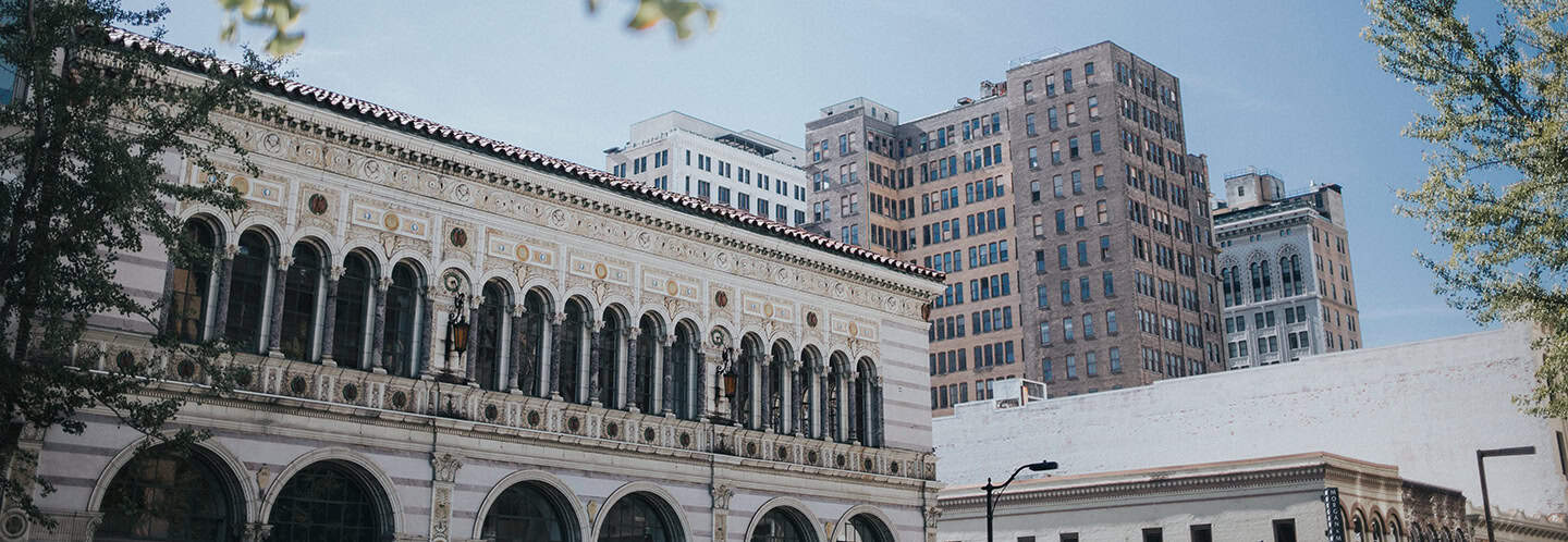 Complete college America building with urban cityscape background, educational institution, higher education, college campus, academic excellence, student success, community college, university, educational initiatives.